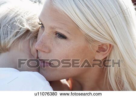 Young mother and son (3-4) close-up focus on mother's face View Large Photo Image Stock Image - Young mother and son (3-4) close-up focus on mother's face. Fotosearch