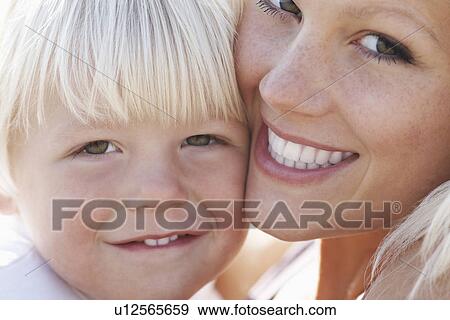 Young mother and son (3-4) close-up View Large Photo Image Stock Photo - Young mother and son (3-4) close-up. Fotosearch