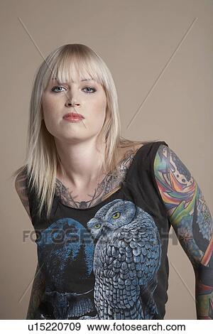 Stock Photo - Young tattooed woman portrait. Fotosearch