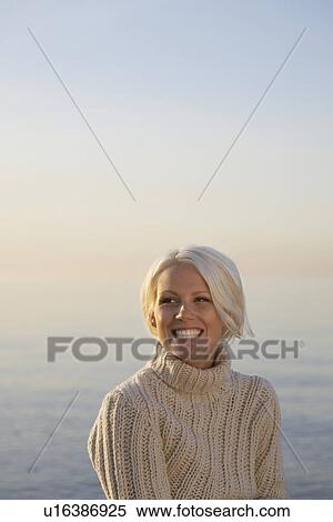 Young woman on beach portrait View Large Photo Image Stock Photography - Young woman on beach portrait. Fotosearch