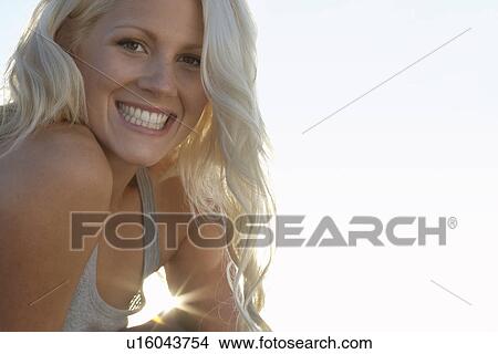 Picture - Young woman smiling close up portrait. Fotosearch