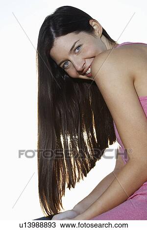 Stock Image - Young woman smiling. Fotosearch