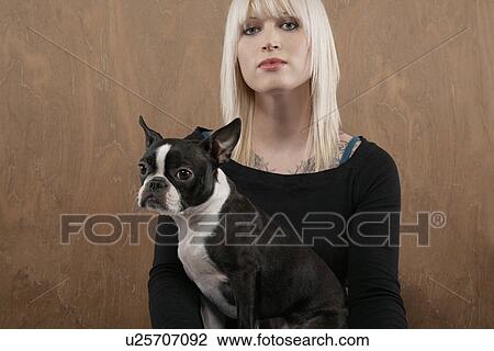 Young woman with French Bulldog on lap View Large Photo Image Stock Image - Young woman with French Bulldog on lap. Fotosearch