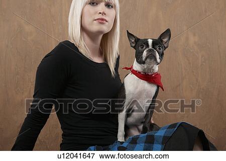 Young woman with French Bulldog on lap View Large Photo Image Stock Photo - Young woman with French Bulldog on lap. Fotosearch