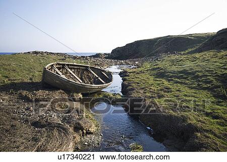 Abandoned boat by stream in peat View Large Photo Image Stock Image - Abandoned boat by stream in peat. Fotosearch