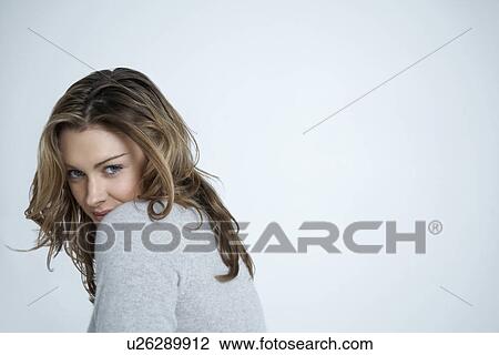 Attractive young woman portrait View Large Photo Image Stock Image - Attractive young woman portrait. Fotosearch