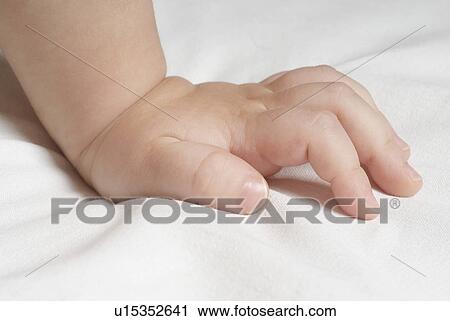 Baby (6-12 months) close up of hand View Large Photo Image Stock Image - Baby (6-12 months) close up of hand. Fotosearch