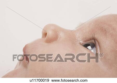 Baby boys face close-up View Large Photo Image Stock Photo - Baby boys face close-up. Fotosearch