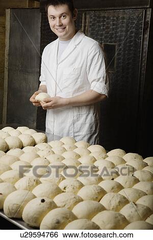 Baker With Balls of Bread Dough Ready to Bake View Large Photo Image Stock Photograph - Baker With Balls of Bread Dough Ready to Bake. Fotosearch