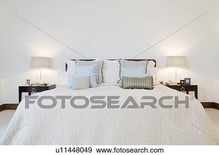 Bed in bedroom View Large Photo Image Stock Photo - Bed in bedroom. Fotosearch