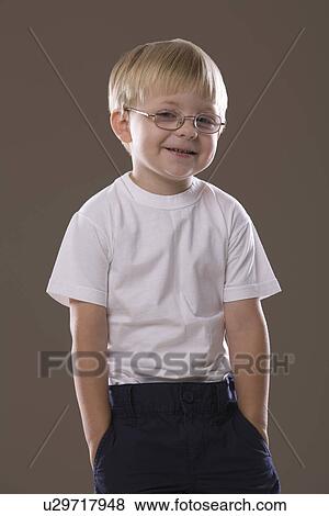 Stock Photo - Blonde-haired boy wearing glasses smiling. Fotosearch