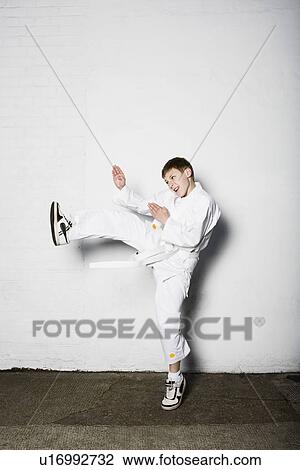 Boy practicing judo View Large Photo Image Stock Image - Boy practicing judo. Fotosearch