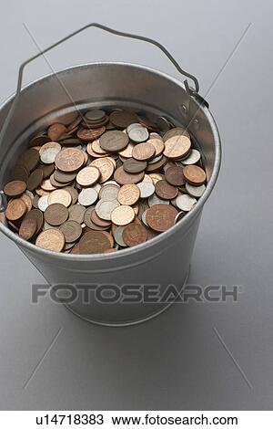 Stock Image - Bucket of coins. Fotosearch