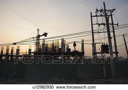 Building Construction Site at Dusk View Large Photo Image Stock Image - Building Construction Site at Dusk. Fotosearch