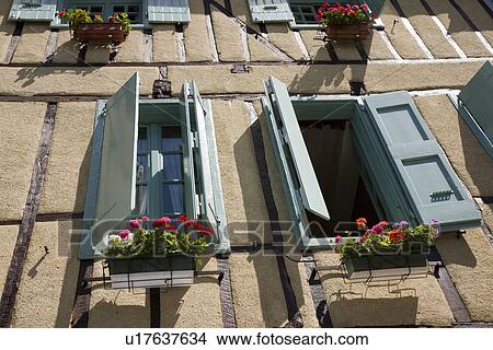 Building exterior with shutters View Large Photo Image Picture - Building exterior with shutters. Fotosearch