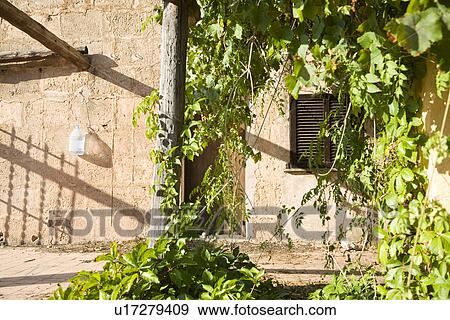 Stock Photo - Building exterior with shutters. Fotosearch