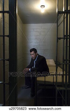 Stock Image - Businessman in prison. Fotosearch