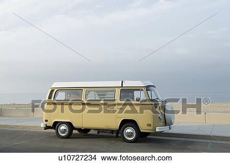 Picture - Camper van at the beach. Fotosearch