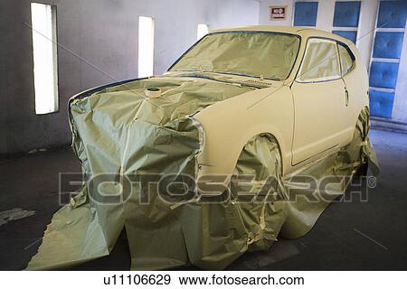 Stock Photo - Car part in garage. Fotosearch