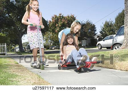 Children playing with skateboard View Large Photo Image Stock Photo - Children playing with skateboard. Fotosearch