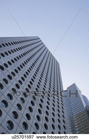 Stock Photo - China Hong Kong low angle view of skyscrapers. Fotosearch