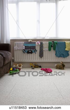Clothes drying on radiator View Large Photo Image Stock Image - Clothes drying on radiator. Fotosearch