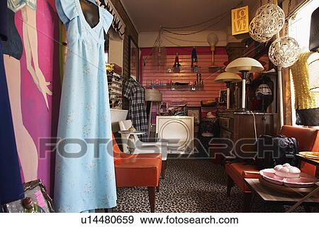 Clothing and Furniture in Crowded Second Hand Store View Large Photo Image Stock Photo - Clothing and Furniture in Crowded Second Hand Store. Fotosearch