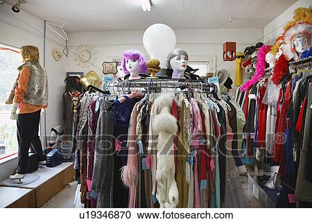 Clothing and Wigs in Crowded Second Hand Store View Large Photo Image Stock Image - Clothing and Wigs in Crowded Second Hand Store. Fotosearch