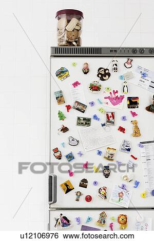 Stock Photograph - Cookies on top of fridge. Fotosearch