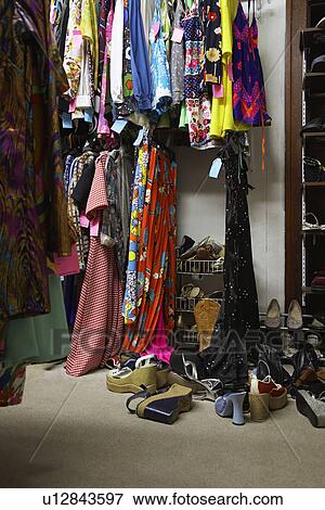 Crowded Clothing Racks and Piled Shoes in Second Hand Store View Large Photo Image Stock Photo - Crowded Clothing Racks and Piled Shoes in Second Hand Store. Fotosearch