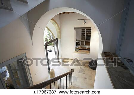Stock Photo - Cyprus view from staircase of hallway in restored antique town house. Fotosearch