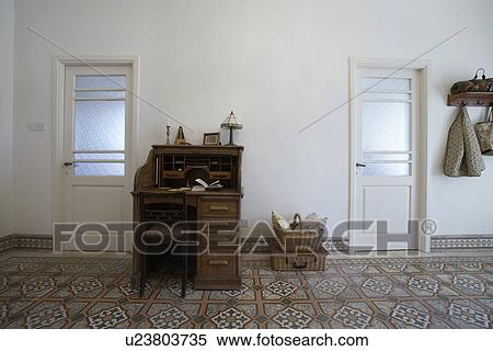 Stock Photography - Cyprus writing desk in entrance hall of 1950's town house. Fotosearch