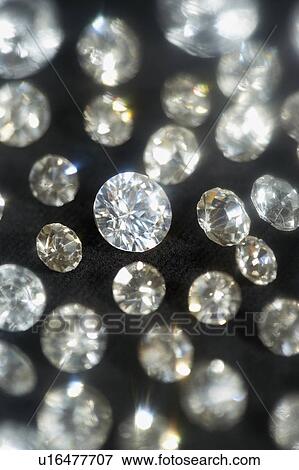 Diamonds on black background selective focus View Large Photo Image Stock Photo - Diamonds on black background selective focus. Fotosearch