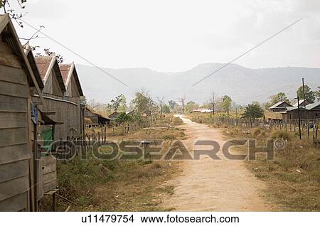 Picture - Dirt Road in Village. Fotosearch