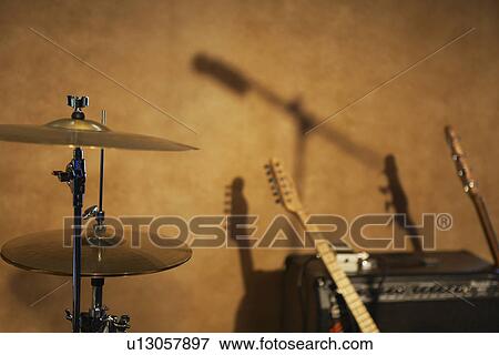 Drum Cymbals and Guitars by Amplifier View Large Photo Image Stock Photo - Drum Cymbals and Guitars by Amplifier. Fotosearch