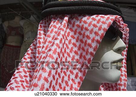 Dubai UAE A mannequin is dressed in a traditional men’s gutra headdress. View Large Photo Image Stock Image - Dubai UAE A mannequin is dressed in a traditional men’s gutra headdress.. Fotosearch