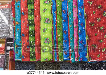 Dubai UAE Bright colored fabrics are for sale in the Bur Dubai souq. View Large Photo Image Stock Photograph - Dubai UAE Bright colored fabrics are for sale in the Bur Dubai souq.. Fotosearch