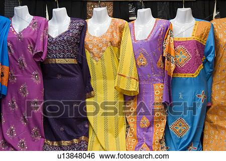 Dubai UAE Colorful women's dresses are displayed for sale at the Al Naif souq in Deira View Large Photo Image Stock Photograph - Dubai UAE Colorful women's dresses are displayed for sale at the Al Naif souq in Deira. Fotosearch