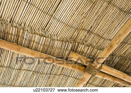 Dubai UAE Detail of a wood thatch roof at the Heritage House Museum in Deira. View Large Photo Image Stock Photo - Dubai UAE Detail of a wood thatch roof at the Heritage House Museum in Deira.. Fotosearch