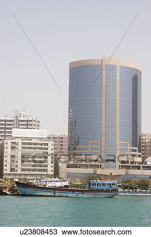 Stock Image - Dubai UAE dhow old wooden sailing vessel Dubai CreekDeira.. Fotosearch