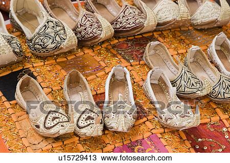 Stock Image - Dubai UAE Genie style sandals are for sale in the Bur Dubai souq in women’s and children’s sizes.. Fotosearch