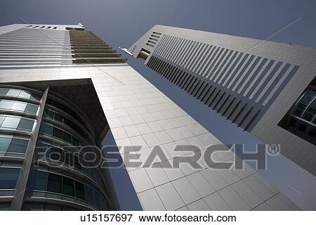 Stock Photo - Dubai UAE View of Emirates Towers on Sheikh Zayed Road in Dubai. Fotosearch