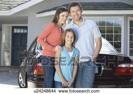 Family outside house with car View Large Photo Image Picture - Family outside house with car. Fotosearch