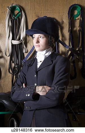 Female horseback rider View Large Photo Image Stock Photograph - Female horseback rider. Fotosearch