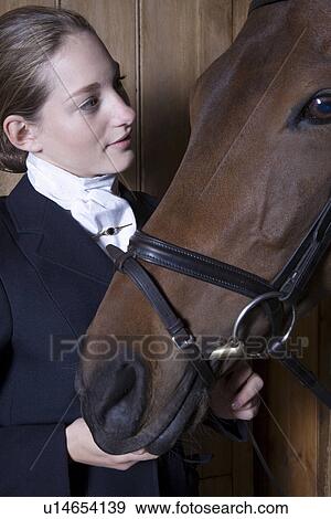 Female horseback rider with horse View Large Photo Image Stock Photo - Female horseback rider with horse. Fotosearch