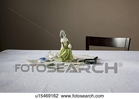 Figurine on table View Large Photo Image Stock Image - Figurine on table. Fotosearch
