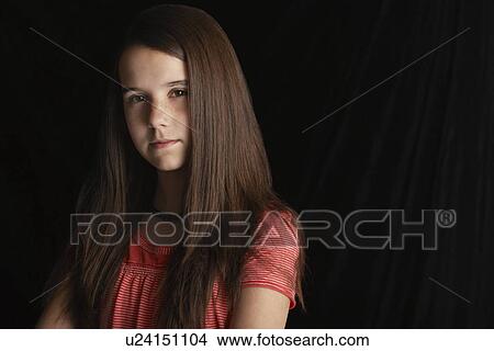 Girl (13-15) on black background portrait View Large Photo Image Picture - Girl (13-15) on black background portrait. Fotosearch