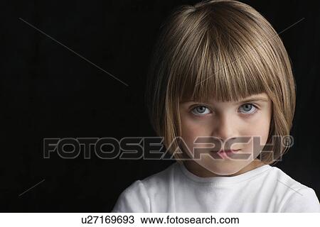 Girl (5-6) on black background portrait close-up View Large Photo Image Stock Image - Girl (5-6) on black background portrait close-up. Fotosearch