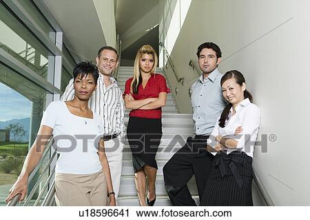 Group of Serious Business People on Stairs Low Angle View Large Photo Image Stock Image - Group of Serious Business People on Stairs Low Angle. Fotosearch