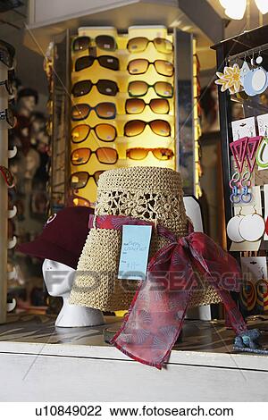 Hats and Sunglasses at Second Hand Store View Large Photo Image Stock Image - Hats and Sunglasses at Second Hand Store. Fotosearch